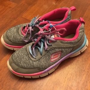 Pink and gray Skechers